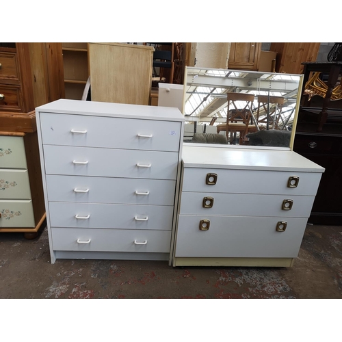 1074 - Two white laminate chests of drawers - largest approx. 92cm high x 72cm wide x 39cm deep