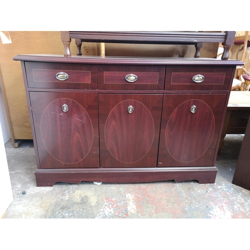 1075 - Three pieces of mahogany effect furniture, one drop leaf swivel top side table with lyre end support... 