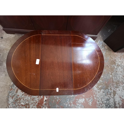 1075 - Three pieces of mahogany effect furniture, one drop leaf swivel top side table with lyre end support... 