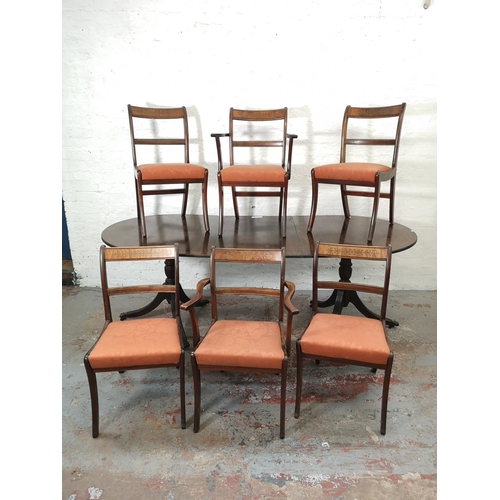 1086 - A Regency style mahogany oval extending dining table with six matching chairs - approx. 74.5cm high ... 