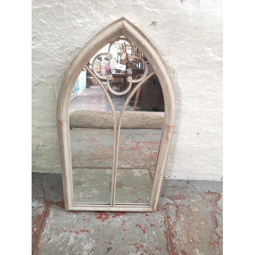 1095 - Two contemporary mirrors, one La Hacienda arched - approx. 105cm high x 56cm wide and one The Range ... 