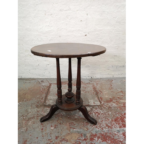 1106 - A 19th century mahogany circular pedestal side table - approx. 75cm high x 68cm in diameter