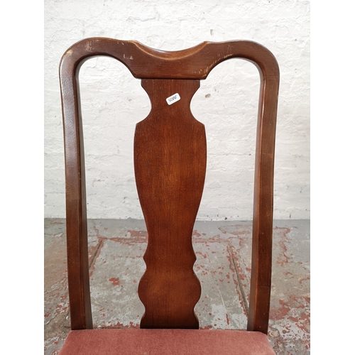 1108 - A set of four Queen Anne style mahogany dining chairs