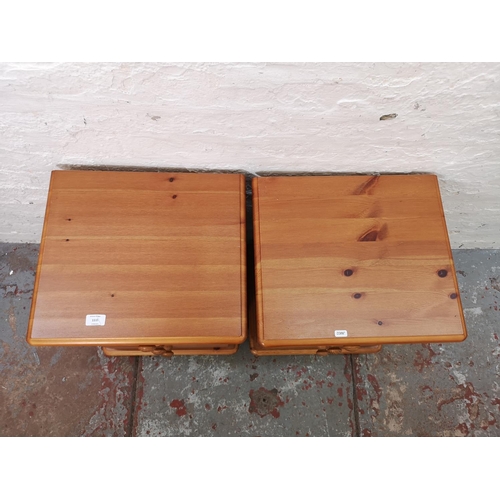 1111 - A pair of modern pine bedside chests of three drawers - approx. 59cm high x 44cm wide x 38cm deep