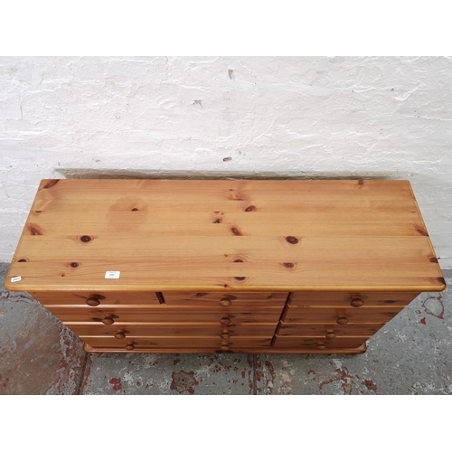 1115 - A modern pine chest of six short and three long drawers - approx. 74.5cm high x 121cm wide x 38cm de... 