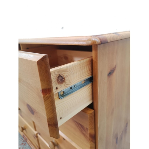 1115 - A modern pine chest of six short and three long drawers - approx. 74.5cm high x 121cm wide x 38cm de... 