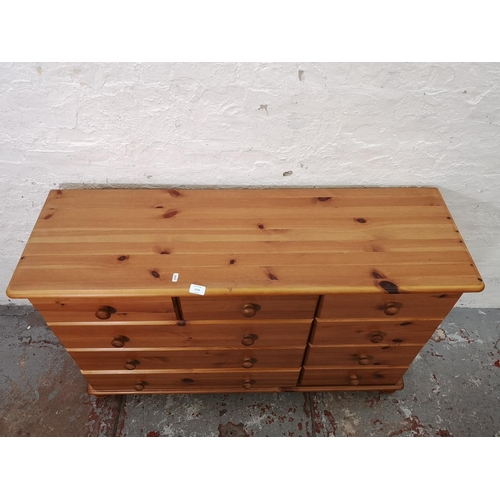 1116 - A modern pine chest of six short and three long drawers - approx. 74.5cm high x 121cm wide x 38cm de... 