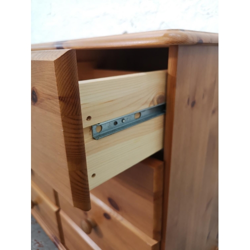 1116 - A modern pine chest of six short and three long drawers - approx. 74.5cm high x 121cm wide x 38cm de... 