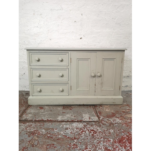 1117B - A modern painted pine media cabinet with two cupboard doors and three drawers - approx. 64cm high x ... 