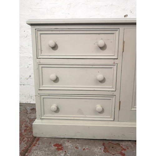 1117B - A modern painted pine media cabinet with two cupboard doors and three drawers - approx. 64cm high x ... 