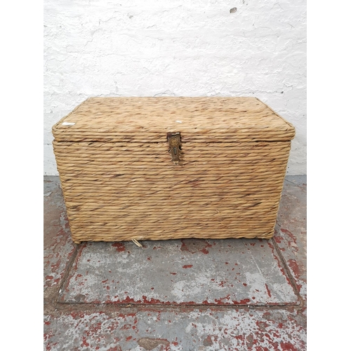 1117C - A modern wicker lidded chest with brown leatherette handles - approx. 46cm high x 77cm wide x 46cm d... 