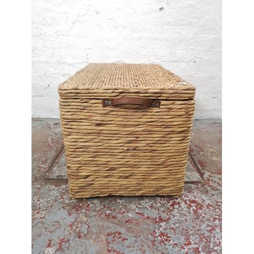 1117C - A modern wicker lidded chest with brown leatherette handles - approx. 46cm high x 77cm wide x 46cm d... 