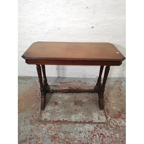 1119 - A 19th century mahogany rectangular side table with lower stretcher - approx. 69cm high x 92cm wide ... 