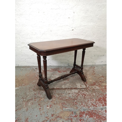 1119 - A 19th century mahogany rectangular side table with lower stretcher - approx. 69cm high x 92cm wide ... 