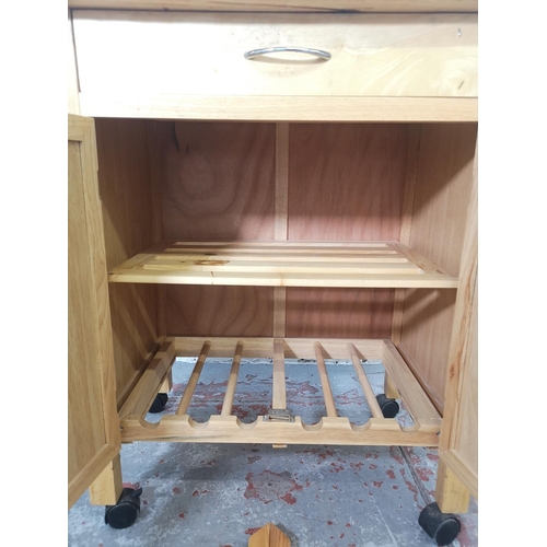 1120 - A modern beech kitchen trolley/butcher's block with two lower cupboard doors and single drawer - app... 