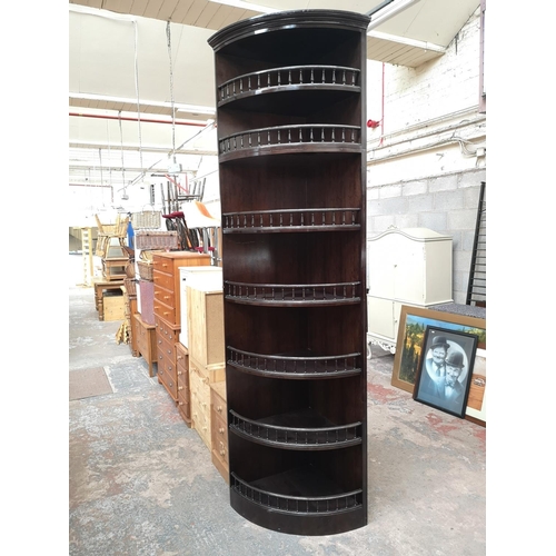 1127 - A contemporary meranti hardwood seven tier freestanding corner cabinet - approx. 275cm high when com... 