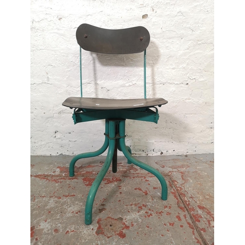 1128 - A 1950's green painted metal industrial adjustable factory chair - approx. 87cm high x 38cm wide x 2... 