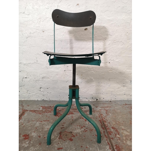 1128 - A 1950's green painted metal industrial adjustable factory chair - approx. 87cm high x 38cm wide x 2... 