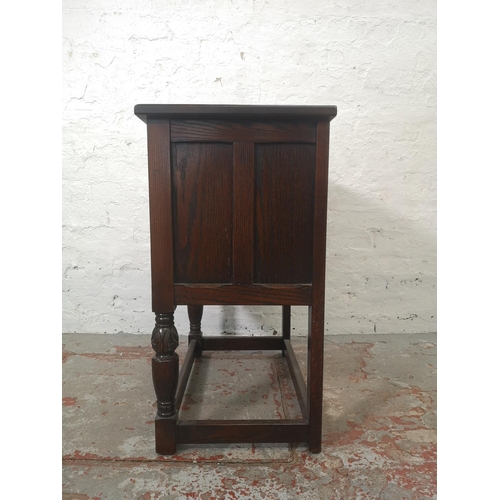 1132 - A Jaycee oak side cabinet with three drawers and one cupboard door - approx. 73cm high x 65cm wide x... 