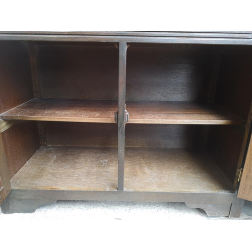 1139 - An oak Dutch dresser with upper two tier plate rack, two drawers and two lower cupboard doors - appr... 