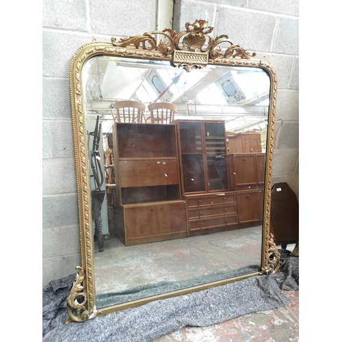 1142 - A 19th century gilt framed over mantle mirror - approx. 175cm high x 13cm wide