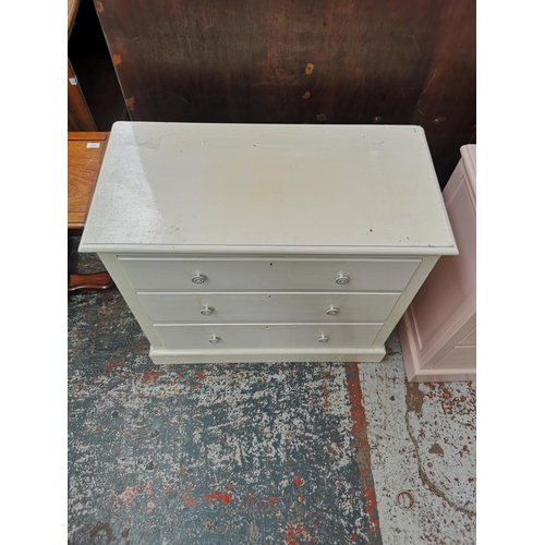 1150 - Two white painted chests of drawers, one three drawer - approx. 81cm high x 91cm wide x 45cm deep an... 