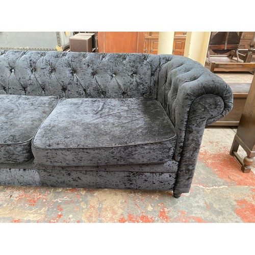 1008 - Two modern black crushed velvet sofas - largest approx. 80cm high x 207cm wide x 88cm deep