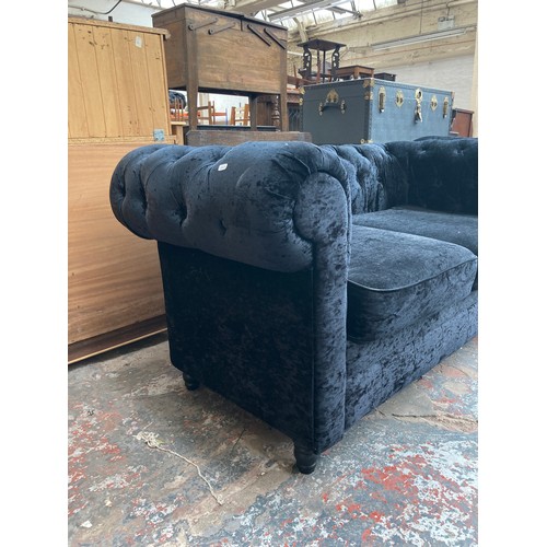 1008 - Two modern black crushed velvet sofas - largest approx. 80cm high x 207cm wide x 88cm deep