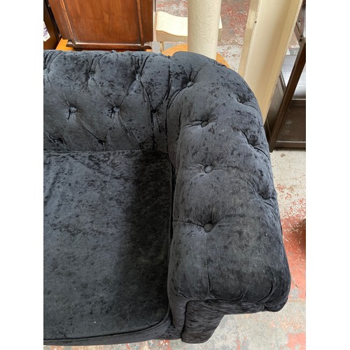 1008 - Two modern black crushed velvet sofas - largest approx. 80cm high x 207cm wide x 88cm deep