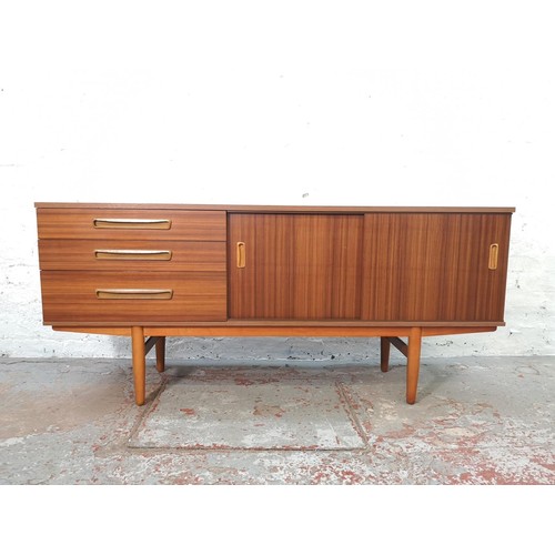 1153 - An Avalon teak effect sideboard with two sliding doors and three drawers - approx. 73cm high x 163cm... 