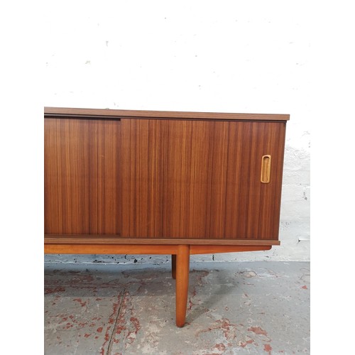 1153 - An Avalon teak effect sideboard with two sliding doors and three drawers - approx. 73cm high x 163cm... 