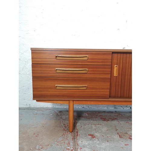 1153 - An Avalon teak effect sideboard with two sliding doors and three drawers - approx. 73cm high x 163cm... 