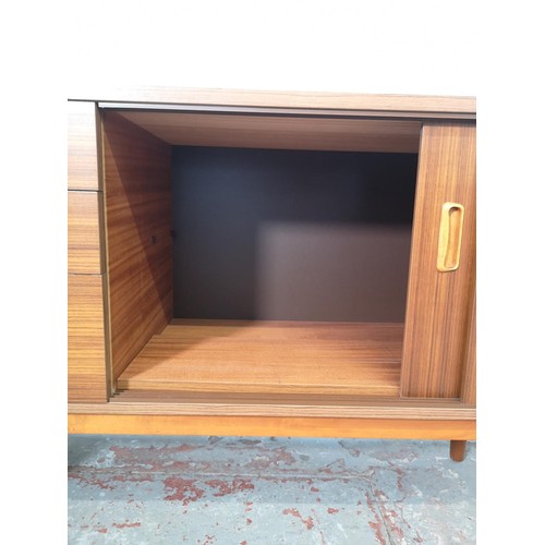 1153 - An Avalon teak effect sideboard with two sliding doors and three drawers - approx. 73cm high x 163cm... 