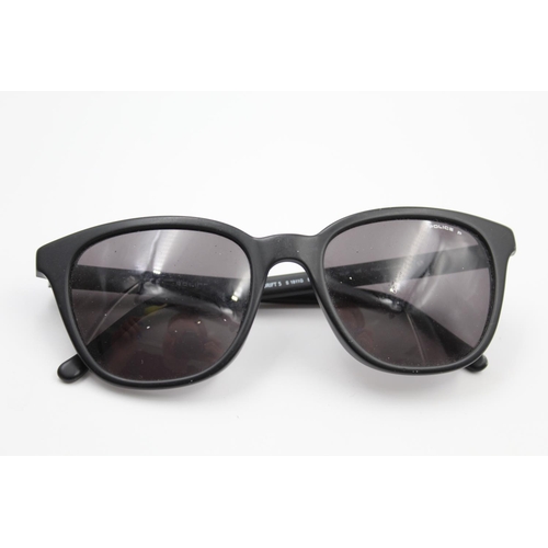 739 - A pair of Police classic black framed gent's sunglasses