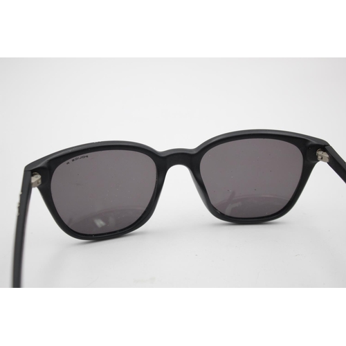 739 - A pair of Police classic black framed gent's sunglasses