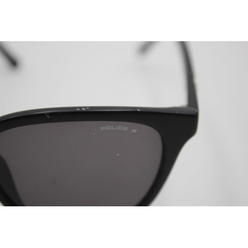 739 - A pair of Police classic black framed gent's sunglasses