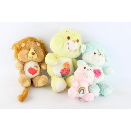 622 - Four vintage Care Bear soft toys to include Care Bear Cousins Lamb and Lion etc.