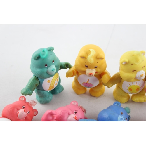 625 - Ten vintage Care Bear plastic toys