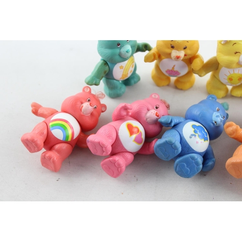 625 - Ten vintage Care Bear plastic toys