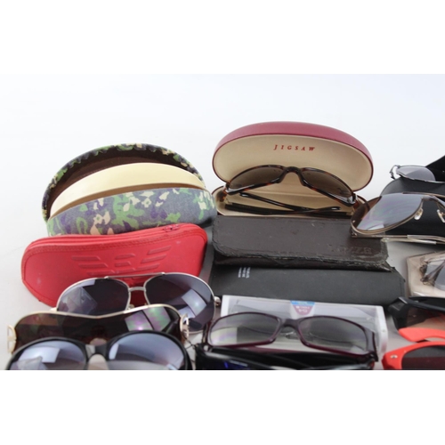 714 - A large collection of assorted sunglasses to include Calvin Klein, Lipsy London, Fabris Lane etc.