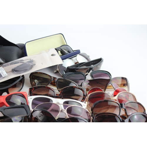 714 - A large collection of assorted sunglasses to include Calvin Klein, Lipsy London, Fabris Lane etc.