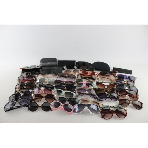 716 - A large collection of assorted pairs of sunglasses to include Jensen, Bloc, Fabris Lane etc.