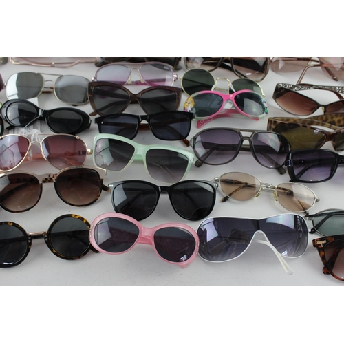 716 - A large collection of assorted pairs of sunglasses to include Jensen, Bloc, Fabris Lane etc.