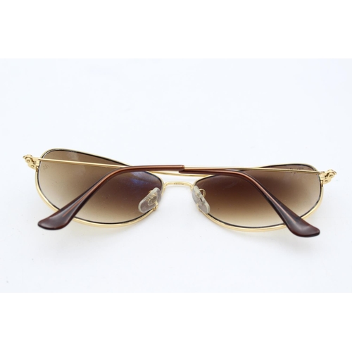 732 - A pair of cased vintage inspired Ray-Ban gold tone cockpit sunglasses