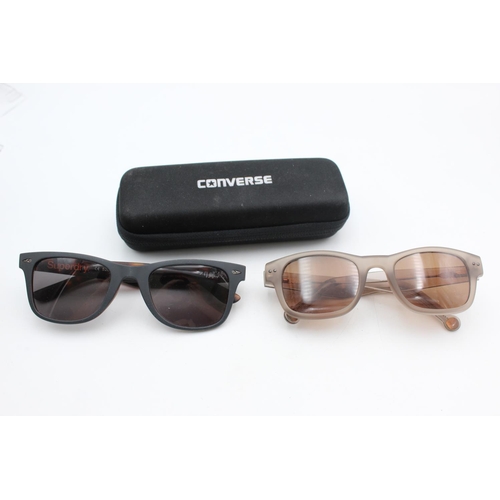 735 - Two pairs of branded unisex sunglasses, one Converse and one Superdry