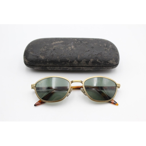 736 - A cased pair of vintage Bausch & Lomb Ray-Ban gold tone sunglasses