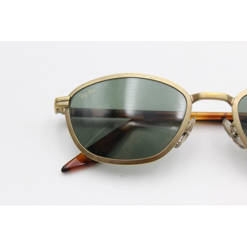 736 - A cased pair of vintage Bausch & Lomb Ray-Ban gold tone sunglasses