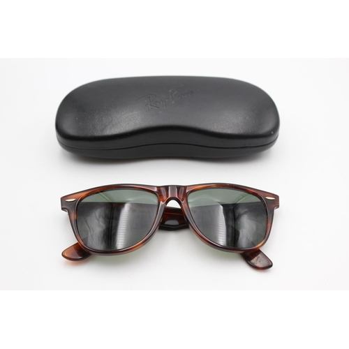 737 - A cased pair of vintage Bausch & Lomb Ray-Ban tortoiseshell effect Wayfarer II sunglasses