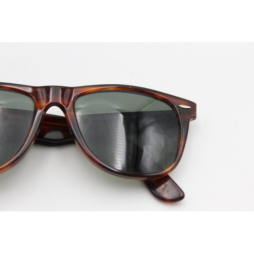 737 - A cased pair of vintage Bausch & Lomb Ray-Ban tortoiseshell effect Wayfarer II sunglasses