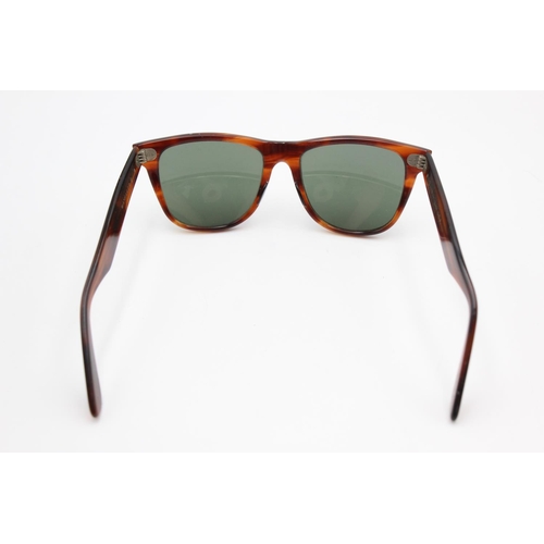 737 - A cased pair of vintage Bausch & Lomb Ray-Ban tortoiseshell effect Wayfarer II sunglasses